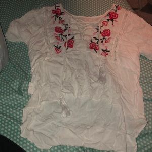 White blouse with roses